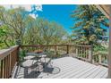 Inviting deck featuring a metal table and chairs, perfect for outdoor dining and relaxation at 6334 Cherokee Dr, Sedalia, CO 80135