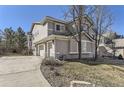 A charming home with a spacious three-car garage and a well-maintained yard at 19406 E Maplewood Pl, Aurora, CO 80016