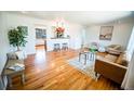 Spacious living room boasts beautiful hardwood floors and an open layout at 920 Eudora St # 201, Denver, CO 80220