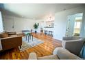 Cozy living room features hardwood floors, modern decor, and bright natural light at 920 Eudora St # 201, Denver, CO 80220