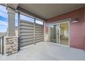 Private outdoor patio space with stylish privacy screens, perfect for relaxation and entertaining guests at 834 W 128Th Pl, Westminster, CO 80234