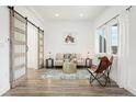 Bright living room with a couch and sitting chair at 426 Knox Ct, Denver, CO 80204