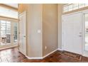 Inviting foyer with tile flooring, leading to the main living areas at 8312 Hackamore Rd, Littleton, CO 80125