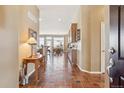 Inviting foyer with tiled floors, ample natural light, and access to the main living areas at 8312 Hackamore Rd, Littleton, CO 80125