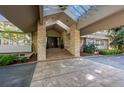 Grand front entrance with stone facade and inviting covered entryway at 4766 S Fillmore Ct, Cherry Hills Village, CO 80113