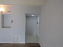 Bright entryway with neutral paint and tile flooring, creating a welcoming ambiance at 9725 E Harvard Ave # 346, Denver, CO 80231