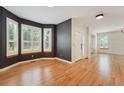 Elegant living room featuring hardwood floors and stylish bay windows with great natural light at 2120 Pintail Dr, Longmont, CO 80504