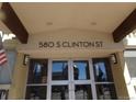 Close-up of building entrance at 580 S Clinton St with glass doors at 580 S Clinton St # 10D, Denver, CO 80247