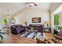 Spacious living area with hardwood floors and a ceiling fan at 16304 10Th St, Mead, CO 80542