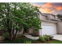 Inviting home exterior with a well-manicured front yard and a two-car garage at 849 Canary Ln, Brighton, CO 80601