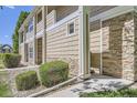 Exterior showcasing a well-maintained unit with manicured landscaping and neutral tones at 3375 Boulder Cir # 204, Broomfield, CO 80023