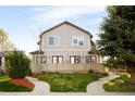 Attractive two-story home with symmetrical facade, complemented by lush green lawn at 2434 S Williams St, Denver, CO 80210