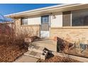 Front entrance with steps leading up to the home at 12573 W 8Th Ave, Golden, CO 80401