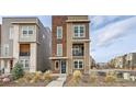 Modern two-story home with a balcony and inviting front entrance at 3574 Corsica Way, Castle Rock, CO 80109