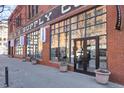 Street-level storefront entrance with brick facade, large windows, and signage for 'The S.H. Supply Co. Robischon Gallery' at 1732 Wazee St # 201, Denver, CO 80202