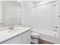 Clean bathroom featuring a shower over tub combination and a white vanity at 9112 Telluride Ct, Commerce City, CO 80022
