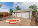 Spacious three-car garage with ample parking space at 8110 Ivy St, Commerce City, CO 80022