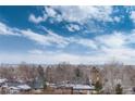 Stunning aerial view showcasing city skyline and neighborhood at 460 E Fremont Pl # 301, Littleton, CO 80122