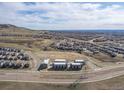 Community with a view of new townhomes surrounded by open space and a developing neighborhood at 2225 S Poppy St, Lakewood, CO 80228