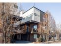 Townhome boasts modern architecture with multi-level balconies and mixed material facade at 3619 Navajo St, Denver, CO 80211