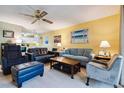 Inviting living room with kitchen view and featuring plush seating and a warm ambiance at 3164 S Wheeling Way # 302, Aurora, CO 80014