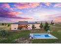 Home with a pool and beautiful sunset views at 7905 Schumaker Rd, Bennett, CO 80102