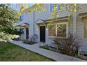 Charming two-story townhouse with manicured lawn, covered entry, and bright, sunlit windows at 3580 Broadway St # 3, Boulder, CO 80304