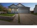 Charming single-Gathering home with a two-car garage and a well-maintained lawn and covered front porch at 462 Chelan St, Golden, CO 80401