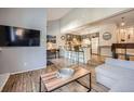 Modern kitchen with gray cabinets and breakfast bar at 246 Broken Lance Dr # 503, Breckenridge, CO 80424