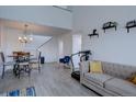 Open living area with a dining space and a comfortable seating area, perfect for gatherings at 11115 E Alameda Ave # 201, Aurora, CO 80012