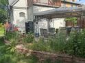 Backyard patio with lovely outdoor seating, ideal for relaxation and entertaining guests at 36 N Logan St, Denver, CO 80203