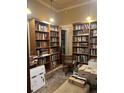 Home office featuring built-in bookshelves, offering ample storage and organization at 36 N Logan St, Denver, CO 80203