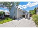 Backyard view featuring a patio and a grassy area, perfect for outdoor enjoyment at 4786 S Yampa St, Aurora, CO 80015