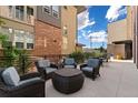 Outdoor patio with seating area, perfect for relaxing or entertaining at 155 S Monaco Pkwy # 114, Denver, CO 80224