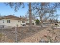 View of backyard with chain link fence at 1010 S Newton St, Denver, CO 80219