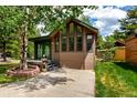 Inviting exterior of this home, showcasing its unique architectural details and attractive landscaping at 85 Revett Dr # 15, Breckenridge, CO 80424
