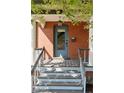 Inviting front door and porch with steps leading to the entrance at 2771 W 38Th Ave, Denver, CO 80211