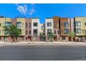 Modern townhome featuring mixed brick and modern architectural elements at 2335 Walnut St # 10, Denver, CO 80205