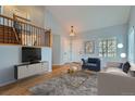 Beautifully staged living room with modern furniture and decor at 20521 E Bellewood Pl, Aurora, CO 80015