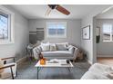 Comfortable living room with a neutral color palette, modern décor, and natural light at 610 E Baseline Rd, Lafayette, CO 80026