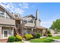 Attractive townhouse with well-maintained landscaping and brick accents at 4760 S Wadsworth Blvd # K205, Littleton, CO 80123