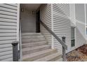 Front entry with stairs leading to the unit at 11115 E Alameda Ave # 202, Aurora, CO 80012