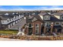 Townhome community with mountain views in the background at 5199 S Fairplay St, Aurora, CO 80015