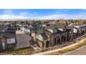 Community of townhomes with mountain views in the background at 5199 S Fairplay St, Aurora, CO 80015