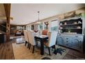 Elegant dining area with stylish decor, dining table, and mountain views, perfect for Gathering gatherings at 351 N Saddle Dr, Idaho Springs, CO 80452