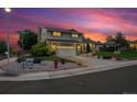 Well-maintained home with a two-car garage, attractive landscaping, and convenient street access at 13266 Canopus Dr, Lone Tree, CO 80124
