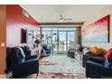 Inviting living room with floor-to-ceiling windows providing abundant natural light and city views at 2001 Lincoln St # 2213, Denver, CO 80202