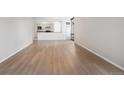 Bright living room with light hardwood floors creating an open and airy space at 1625 Larimer St # 1001, Denver, CO 80202