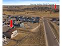 Stunning aerial view of a home near Spring Valley Golf Course with a spacious yard at 42855 Hawktree Cir, Elizabeth, CO 80107
