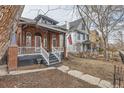 Charming brick home entrance with a welcoming front porch and a clear view of the front door at 1229 Josephine St, Denver, CO 80206